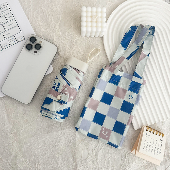 Six-Fold Pocket Umbrella-blue – Macaron Checkered Design with Hidden Smiley Face & UV Protection